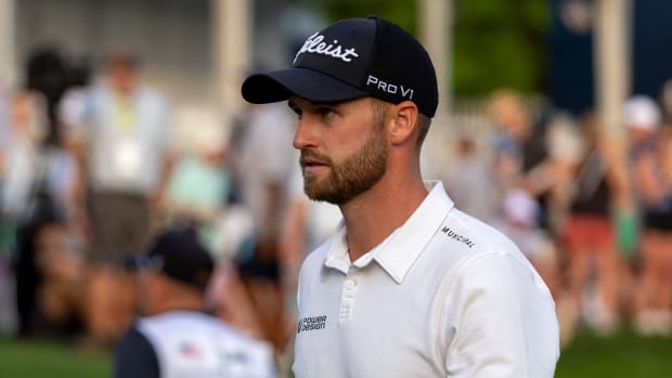 Wyndham Clark walks from the 18th green during the third round of THE PLAYERS Championship golf tournament.
